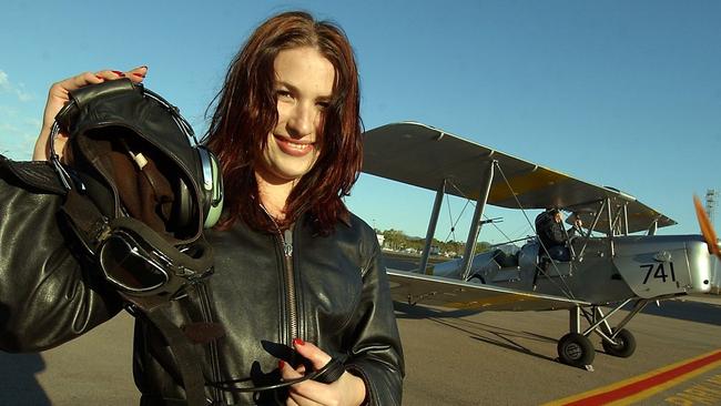 Vikki Campion prepares for a Tiger Moth flight in her early career as a journalist.