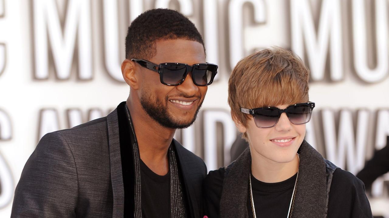 Usher helped mentor Bieber after the latter was discovered by Scooter Braun at age 13.