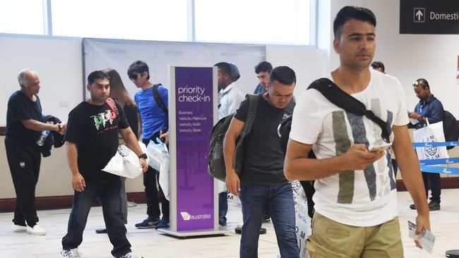 Manus asylum-seekers depart PNG for the US, where they were due to start a new life. Picture: Brian Cassey