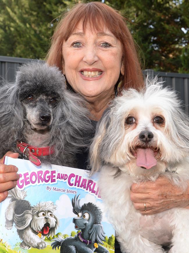 Marcie Jones with one of her childrens’ books titled George and Charlie.