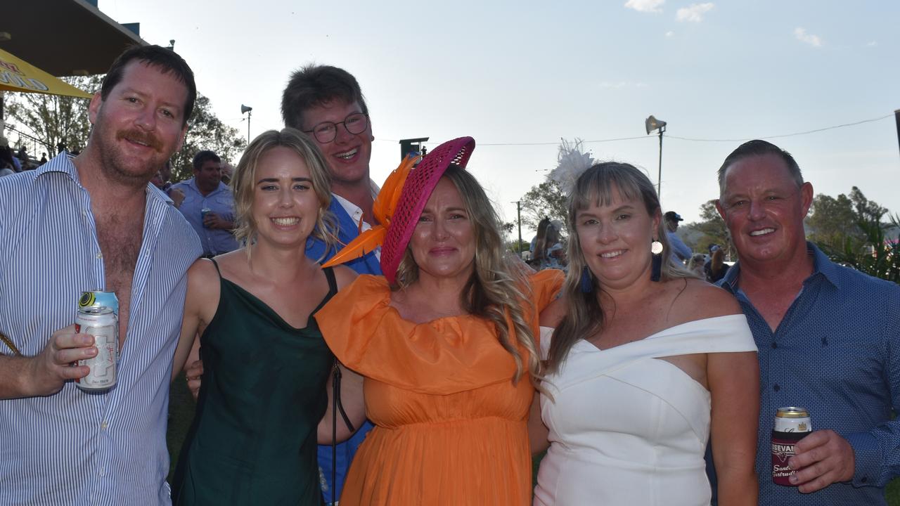 (Left to right) John Long, Lucy, Lindy Bennett, Deborah Herrenberg, Craig Ruhln and Andrew Los (behind) at the Brown Macaulay &amp; Warren Gympie Cup Day, 2021.