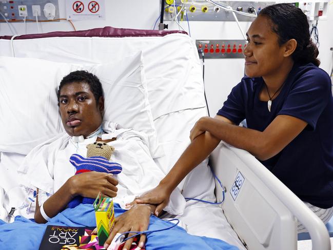 Ronny in hospital at the RPA with his aunt, Jisilla. Picture: Sam Ruttyn