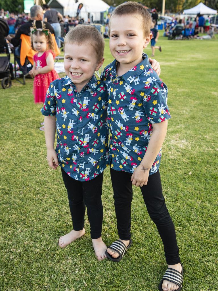 Cruz (left) and Leo Scott at the Triple M Mayoral Carols by Candlelight, Sunday, December 11, 2022. Picture: Kevin Farmer