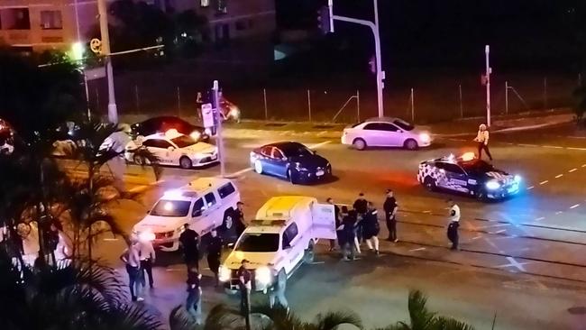 Policing arresting two people in central Surfers Paradise on Sunday night. Picture: Tiffany Potter.