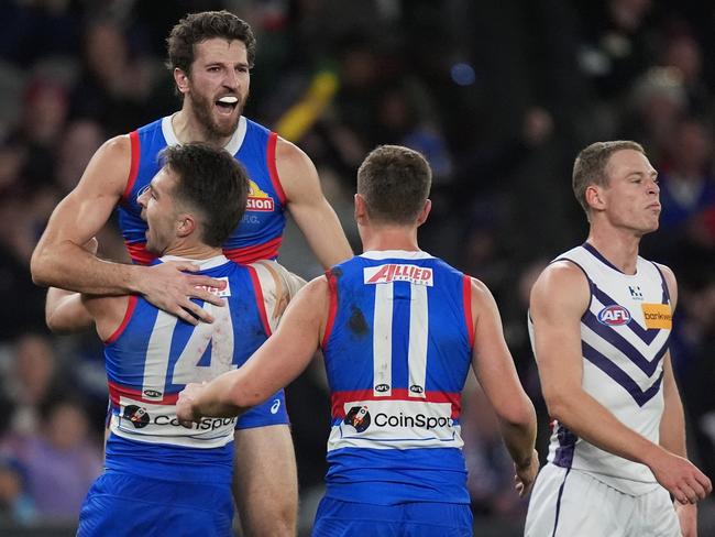 MELBOURNE, AUSTRALIA - JUNE 15: Marcus Bontempelli of the Bulldogs celebrates kicking a goal during the round 14 AFL match between Western Bulldogs and Fremantle Dockers at Marvel Stadium, on June 15, 2024, in Melbourne, Australia. (Photo by Daniel Pockett/Getty Images)