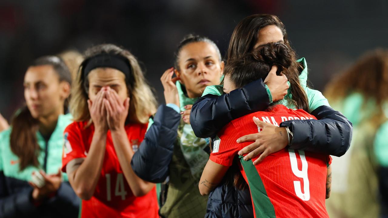 Portuguese players were in tears. Photo by Phil Walter/Getty Images