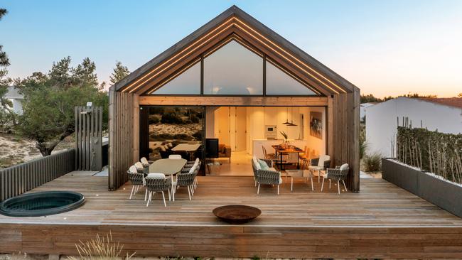 A Wood Cabin-Like Beach House Stands out on One of Portugal’s Car-Free Islands. The contemporary, eco-friendly home in the popular Algarve region is nothing like its Mediterranean-style neighbors. Photo: BHHS