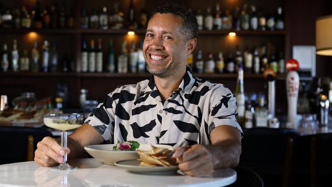 Owner of Guerilla Davy O'Rourke with the restaurant's signature dish, ceviche served with a side of corn chips and a spicy margarita. Picture: Brendan Radke