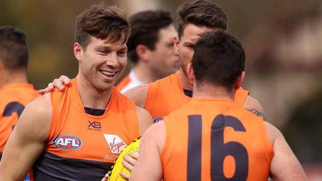 Toby Greene shares a moment with teammates Daniel Lloyd and Brent Daniels at GWS training. Picture: Phil Hillyard