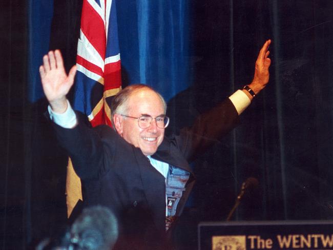 1996: Liberal party Leader John Howard waves to the crowd as he acknowledges his federal election victory.