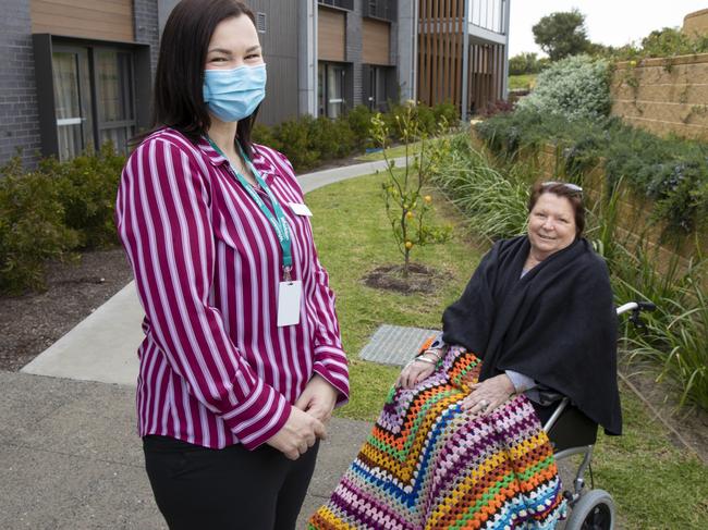 Lauren Smith, who used to be a GP’s assistant doing mainly admin work before swtiching to a cliniical care co-ordintor role, with client Bev Wright. Picture: Peter Stoop