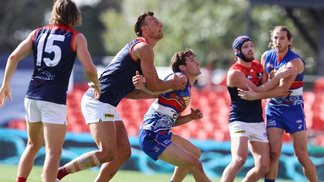 Josh Dunkley gave up 18kg to Dees big man Braydon Preuss. Picture: Michael Klein