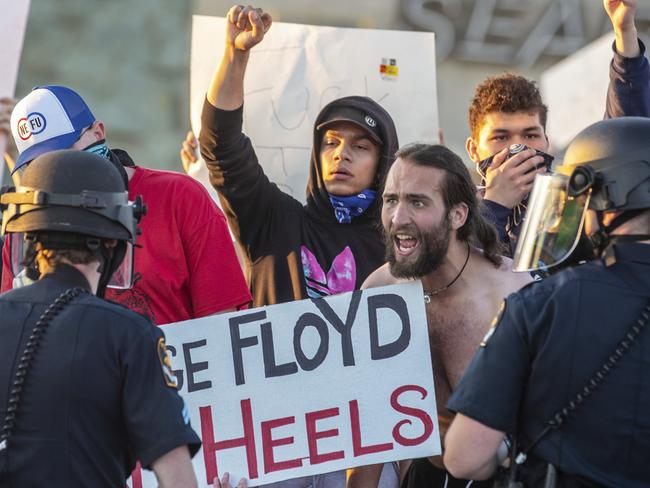 A man yells at Omaha police during a protest at 72nd and Dodge Streets in Nebraska. Picture: Chris Machian/Omaha World-Herald via AP