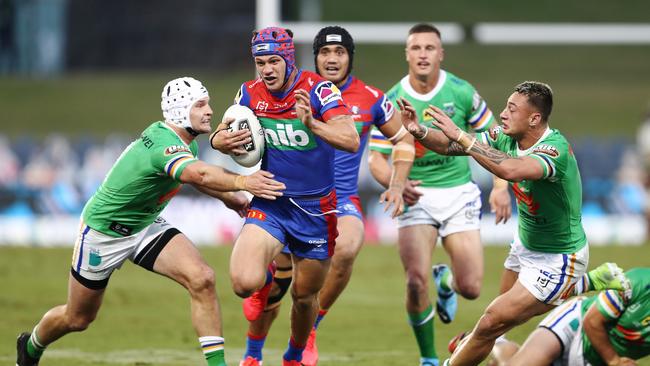 Kalyn Ponga of the Knights runs the ball during the Round 4 NRL match between the Canberra Raiders and the Newcastle Knights at Campbelltown Sports Stadium in Sydney, Sunday, June 7, 2020. (AAP Image/Brendon Thorne) NO ARCHIVING, EDITORIAL USE ONLY