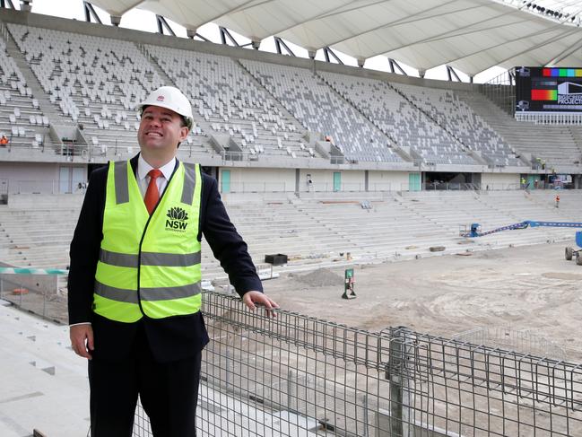 NSW Minister for Sport Stuart Ayres is happy to turn up for a photo opportunity at the new Western Sydney Stadium, but has nothing to say about the loss of iconic Macquarie Ice Rink.