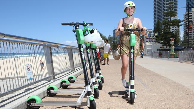 Just tap and go, the e-scooters have been set up ready to ride around Surfers Paradise. Photo: Glenn Hampson