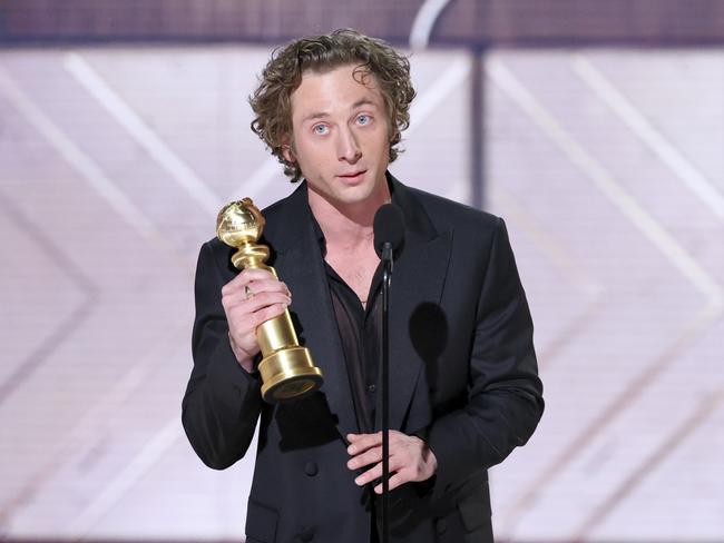 Jeremy Allen White accepts his Golden Globe for best male actor in a TV series - musical or comedy. Picture: Getty Images