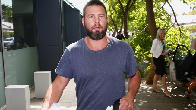 Former West Coast Eagles AFL player Ben Cousins leaves the Fremantle Magistrates Court in Perth, Friday, Jan. 20, 2017. (AAP Image/Richard Wainwright)