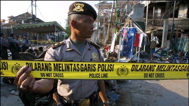 Indonesian Police at the scene of the bombing at the Sari Club, in Kuta. Picture: Getty Images