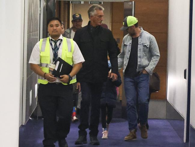 The couple and their young children were escorted out the VIP exit of Sydney Airport. Picture: Media Mode