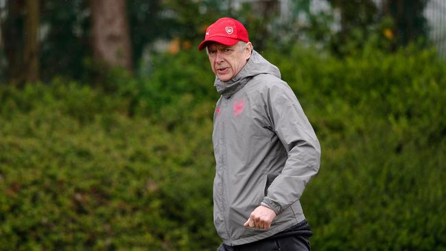 Arsenal manager Arsene Wenger arrives for a training session at the club's complex in London.