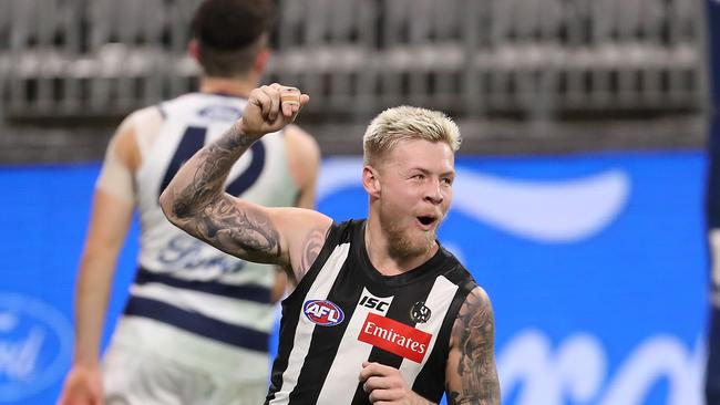 PERTH, AUSTRALIA – JULY 16: Jordan De Goey of the Magpies celebrates a goal during the round 7 AFL match between the Geelong Cats and the Collingwood Magpies at Optus Stadium on July 16, 2020 in Perth, Australia. (Photo by Paul Kane/Getty Images)