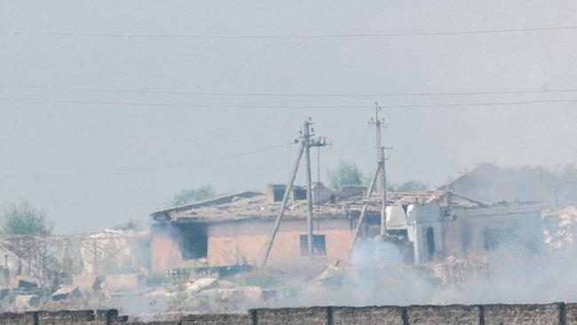 Smoke billows from a munitions depot in the village of Mayskoye, Crimea after a Ukraine attack. Picture: AFP.