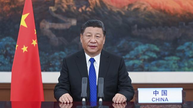 Chinese President Xi Jinping delivers a speech at the opening of the 73rd World Health Assembly via video link in Beijing, Monday, May 18, 2020. (Li Xueren/Xinhua via AP)