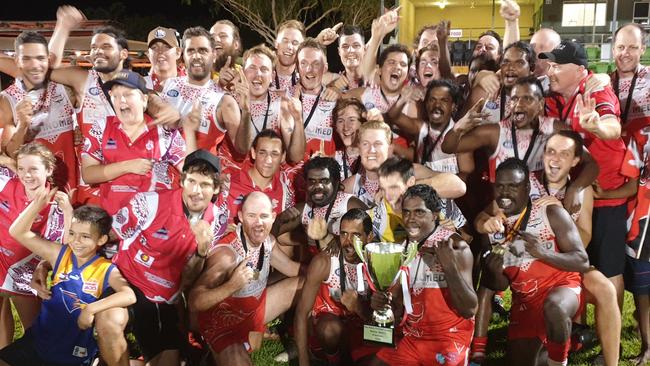 Winners are grinners: Katherine Souths players show off the BRFL premiership cup last night. Picture: Grey Morris