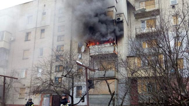 Firefighters pushing out a fire after a shell explosion in a residential building from a Russian shelling in Bilozerka village, Kherson region, amid Russian invasion in Ukraine. Picture: AFP