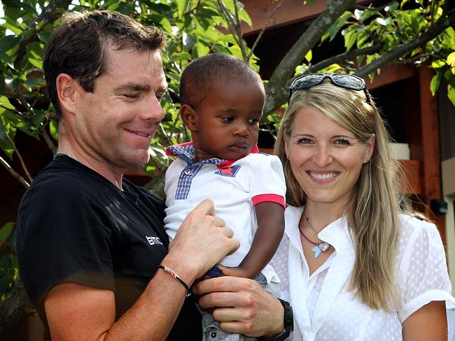 Cadel Evans with his son Robel and wife Chiara.