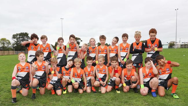 Geelong West Giants under-9 football team pull their funniest faces. Picture: Alan Barber