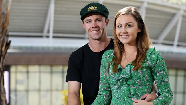 Australian Test cricketer Travis Head with girlfriend Jess Davies. Picture: Tricia Watkinson