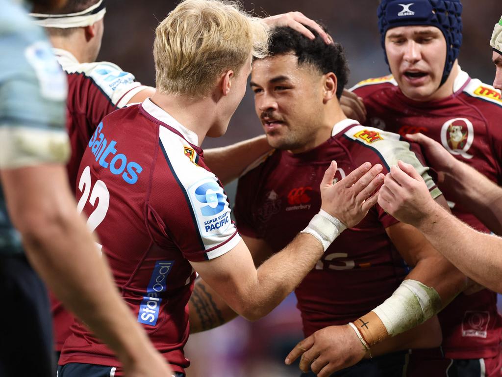 Hunter Paisami (C) copped a three-game ban for a dangerous tackle - but still hopes to face the Waratahs. Picture: Getty