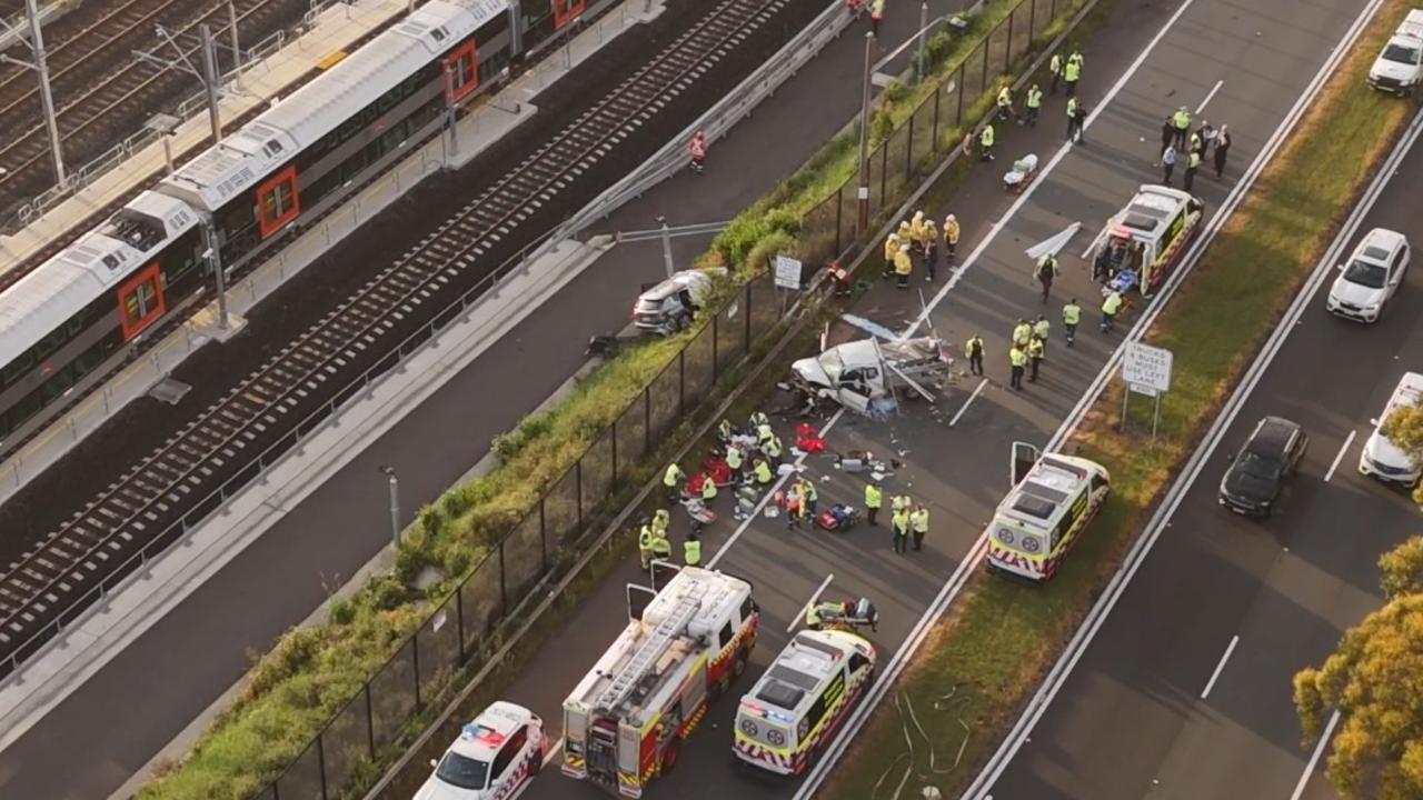 Multiple injuries, car lands near train tracks after major crash