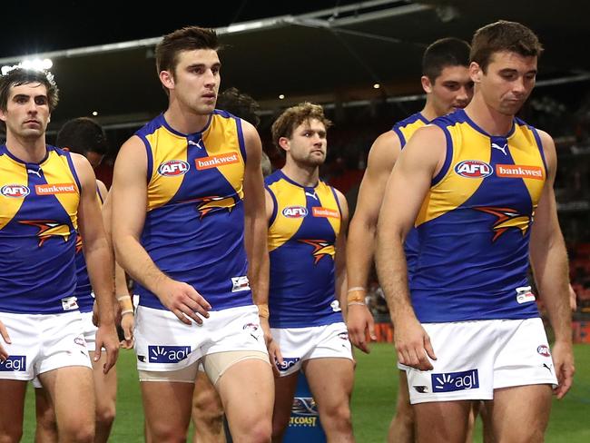 SYDNEY, AUSTRALIA - SEPTEMBER 16: Eagles players leave the field after losing  the AFL First Semi Final match between the Greater Western Sydney Giants and the West Coast Eagles at Spotless Stadium on September 16, 2017 in Sydney, Australia.  (Photo by Cameron Spencer/Getty Images)