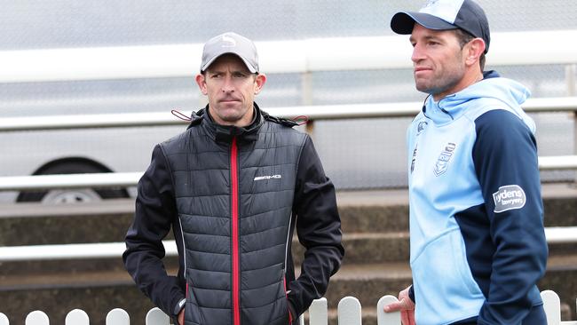 Hugh Bowman takes in NSW training with Danny Buderus. (Brett Costello)