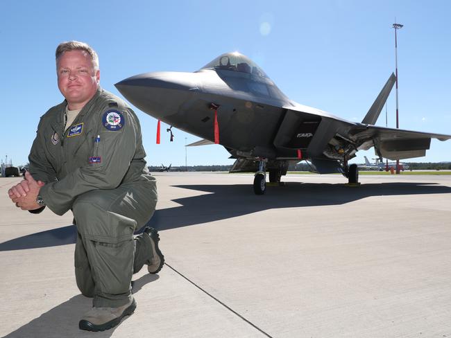 Colonel Brian “Barley” Baldwin with one of the Raptors at RAAF Base Amberley. Picture: Peter Wallis