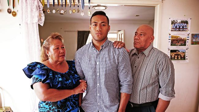 Disgraced NRL player Tim Simona is back living at home with his parents Pele (left) and Ene Simona in Macquarie Fields. Picture: Sam Ruttyn