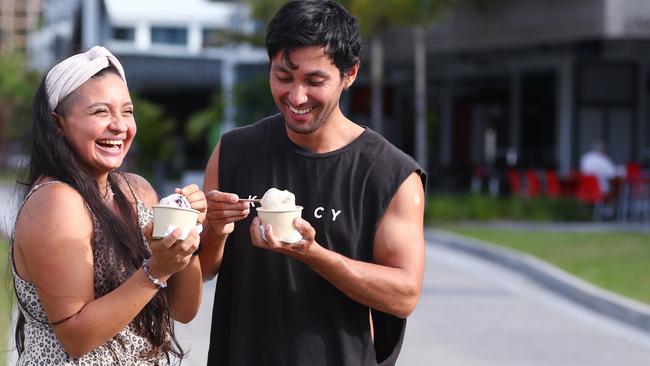 Pamela Sepulveva and Rogers Munoz of Parramatta Park enjoy some ice cream and a stroll along the Cairns Esplanade Dining Precint on Tuesday afternoon. Picture: Brendan Radke