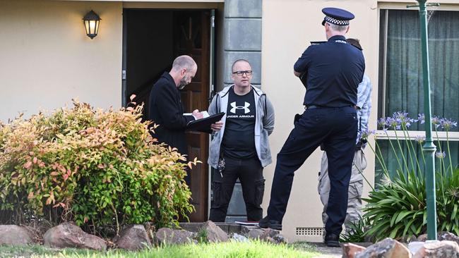 Police at the Wark Court, Morphett Vale, house where a woman was found dead on Sunday night. Picture: Brenton Edwards