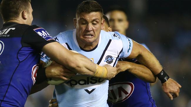 Chris Heighington of the Sharks in action.