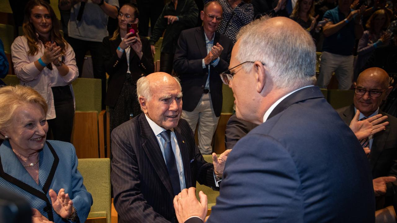 Scott Morrison greets former prime minister John Howard after his speech. Picture: Jason Edwards