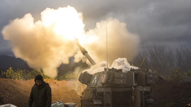 An Israeli artillery unit fires across the border towards Lebanon. Hezbollah has traded cross-border fire with Israel in the most significant clashes since 2006. Picture: Amir Levy/Getty Images