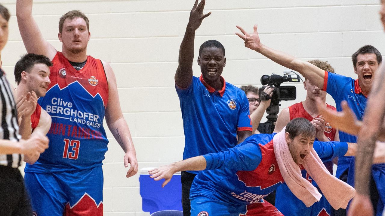 The Toowoomba Mountaineers bench celebrate a point.