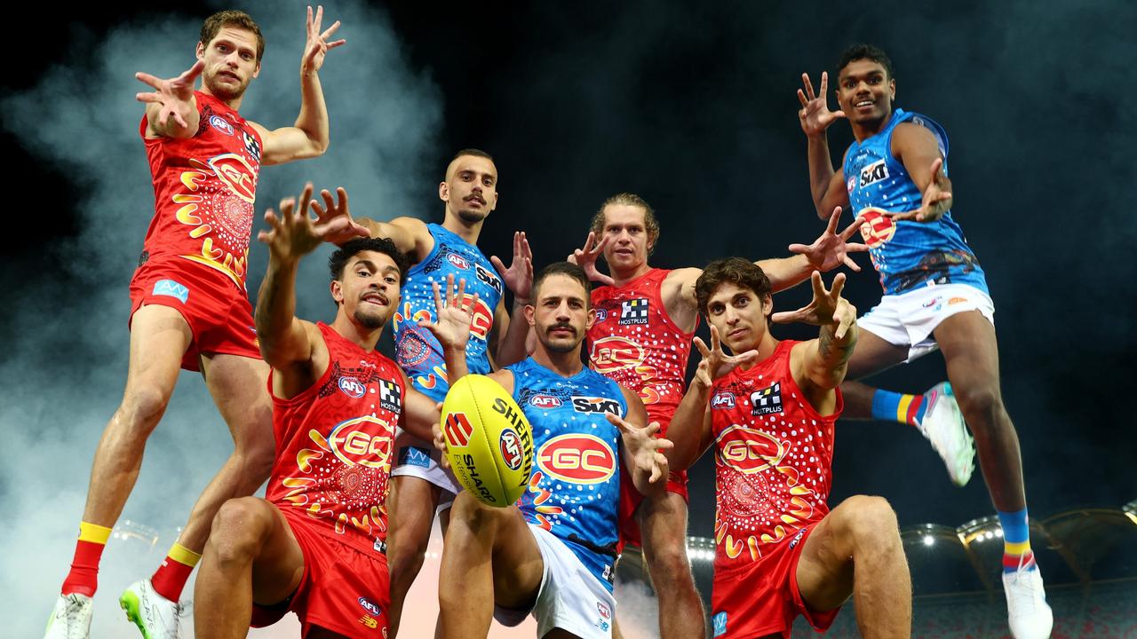 Gold Coast Suns players Jy Farrar, Malcolm Rosas Jr, Joel Jeffrey, Ben Long, Jed Anderson, Sean Lemmens and Lloyd Johnston in the team’s 2023 Indigenous jerseys. Picture: Chris Hyde/Getty Images