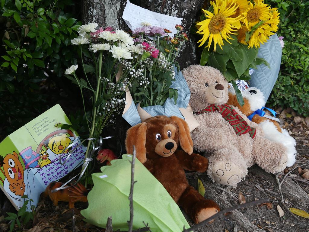 Members of the public have laid flowers and left teddies at the Goodstart Early Learning Centre. Picture: Brendan Radke