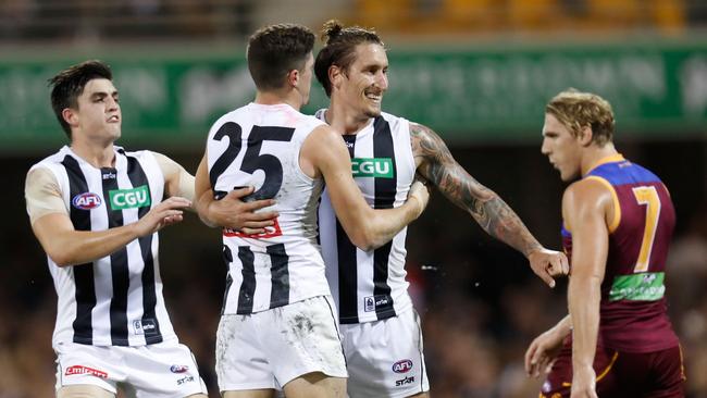 Collingwood celebrate another goal in the 78-point thrashing of Brisbane at the Gabba in 2016.