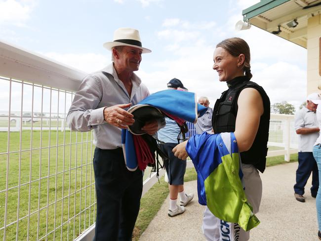 The Beaudesert Race Club holds its Saturday race meet. (L-R) Trainer Mark Palmer and jockey Brooke Ainsworth talk before Race 3. Picture: Brendan Radke.