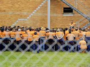 Hundreds of Aurizon rail workers at the Redbank rail workshops attend a union meeting at the facility in 2014. Aurizon planned to close the facility but today announced a new deal that will keep the workshop open. Picture: Claudia Baxter